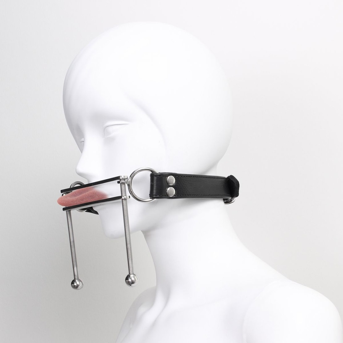 BAVAGLIO SCHIACCIA LINGUA A MORSETTO SEX TOY...
